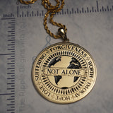 Human Being Medallion Necklace - in Brass