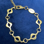 Full back view of the Sacred Mandorla Golden Chain Bracelet, smooth golden texture for a beautiful feel on skin, crafted in brass with 14K gold PVD plating