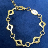 Full back view of the Sacred Mandorla Golden Chain Bracelet, smooth golden texture for a beautiful feel on skin, crafted in brass with 14K gold PVD plating