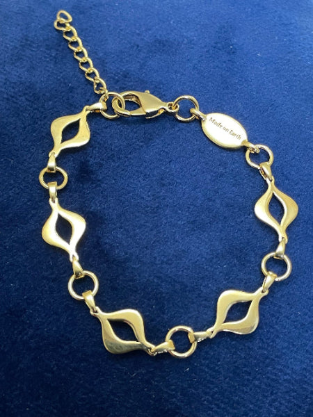 Full back view of the Sacred Mandorla Golden Chain Bracelet, smooth golden texture for a beautiful feel on skin, crafted in brass with 14K gold PVD plating