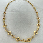 Elegant 14K gold-plated mandorla chain symbolizing divine feminine unity.
Handcrafted, engraved “Made on Earth.” A sacred geometry necklace.